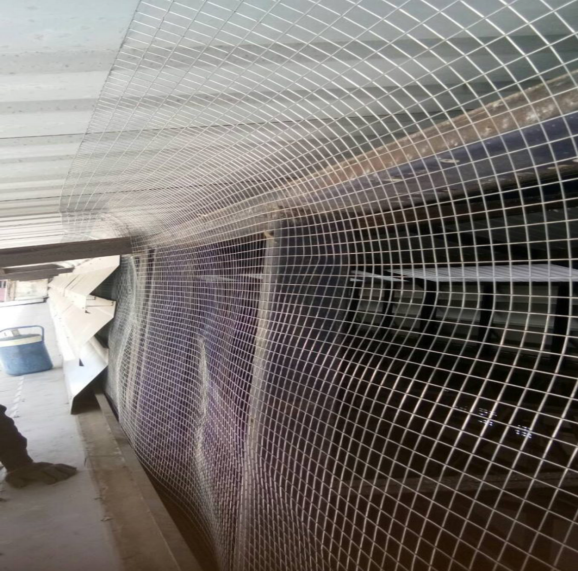 Installation of bird netting in the factory